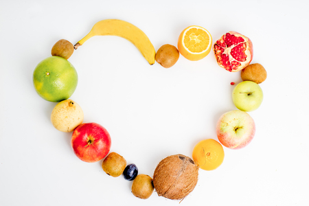 Creative layout made of fruits on a white backgroundの写真素材