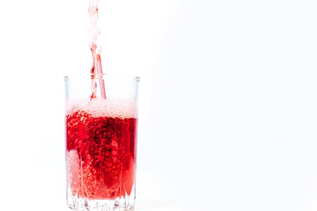 different fruit and juice or smoothie in a glassの写真素材