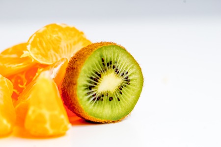 Creative layout made of fruits on a white backgroundの写真素材