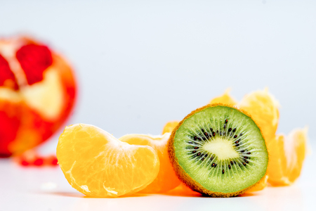 Creative layout made of fruits on a white backgroundの写真素材