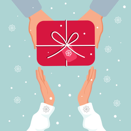 Top view of male and female hands holding a red gift box with a white ribbon and tag. A gift for a Merry Christmas, New Year. Vector illustration. Out it.のイラスト素材