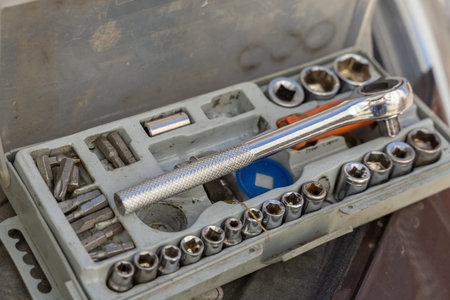 Auto mechanic tool kit. The mechanic has prepared tools for diagnosis and repair. Tools under the...