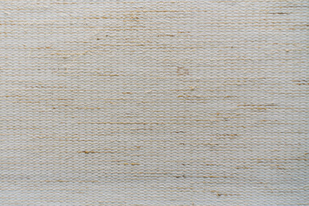 texture of coarse fiber light fabric. rough textile background
