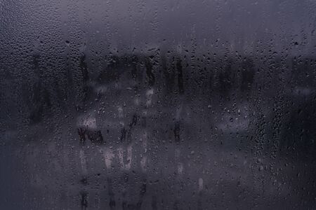 wet glass texture. dark backgroundの写真素材