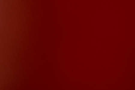 red surface-to-be with a weak paper texture. background paperの写真素材