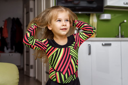 beautiful girl 4 years old in a gymnastic leotardの写真素材
