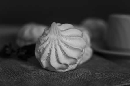marshmallow in a dark monochrome key. disturbing environment. harm to sweetsの写真素材