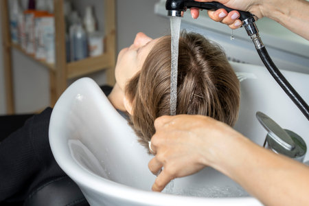 women wash their hair in a beauty salon