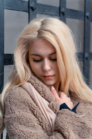 01 14 2020 Moscow, Russian Federation. sad young beautiful blonde womanのeditorial素材