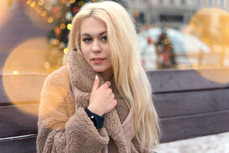 01 14 2020 Moscow, Russian Federation. woman in christmas decorations on the streetのeditorial素材