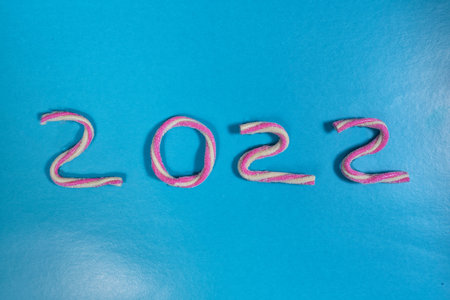 new year concept. text 2022 made from gummies.