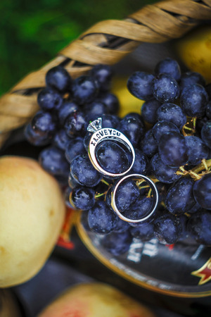 Wedding engagement rings diamonds fruit wallpaper background texture bride groom Grapes berries diamond loveの写真素材