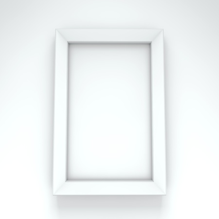 Blank white frame hanging on white wall の写真素材
