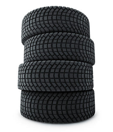 Stack of automobile winter tires isolated on white background.の写真素材