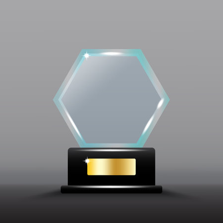Hexagonal glass trophy. Shiny gold plaque detail. Dark grey background. Elegant vector design.のイラスト素材