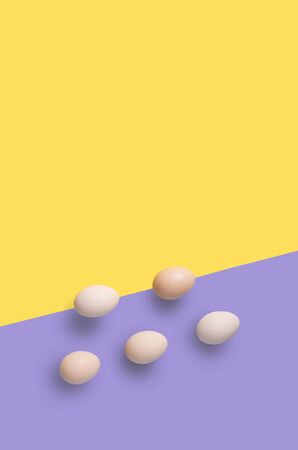 5 brown eggs on the flat background with geometric arragngmentの写真素材