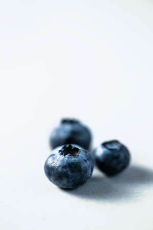 Beautiful blueberry close up background with deep shadowsの写真素材