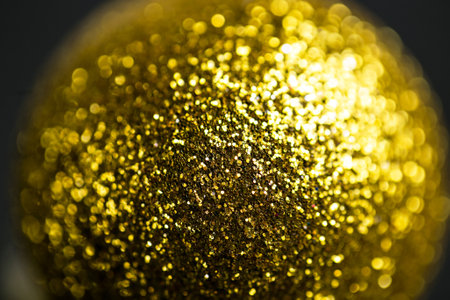Golden abstract background glitter sequins for party Christmas New Years celebrationの写真素材