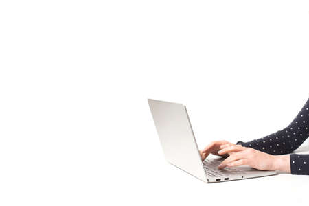 Woman hands and laptop online textingの写真素材