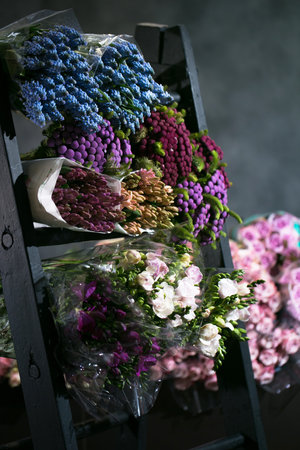 Flowers in the flower store background tulips roses bouquet backdrop online shop