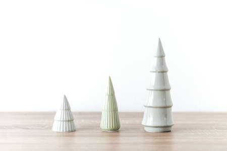 Minimal three concept christmas trees new year celebration symbol interior designの写真素材
