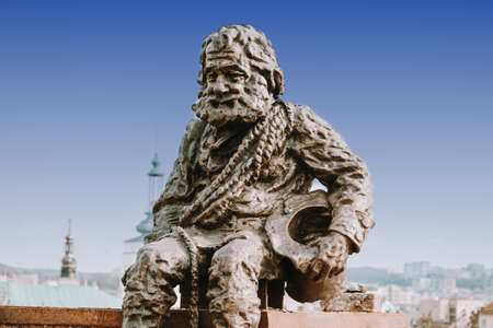 Sculpture a chimney sweep on the roof of the House of Legends in Lviv, Ukraine. Lvov is the most attractive city for tourists in Ukraine.のeditorial素材