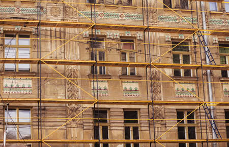 03.08.2019 Lviv, Ukraine. The process of restoration of an ancient house, facade, frescos. Restoration of architectural monumentsのeditorial素材