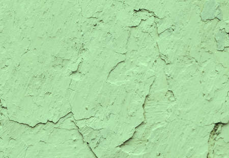 Old concrete green walls with cracks background paint, workpiece for design, copy spaseの写真素材