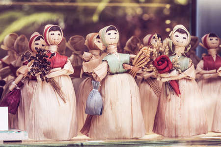 Old Budva, Montenegro - July 19, 2019: Souvenirs from handmade doll in Montenegro, gifts for sale.のeditorial素材