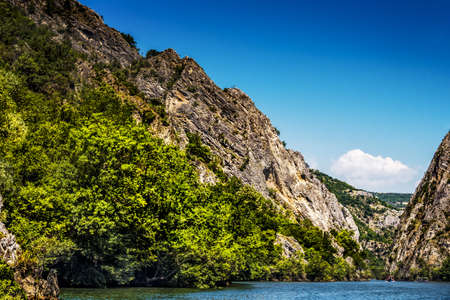 View of beautiful tourist attraction, the idyllic Matka Lake at Matka Canyon in the Skopje surroundings. Macedonia. Mountains.の写真素材