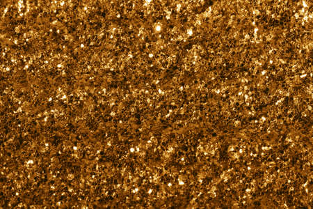 gold giltter texture festive abstract background, workpiece for design,Christmas background, soft focusの写真素材