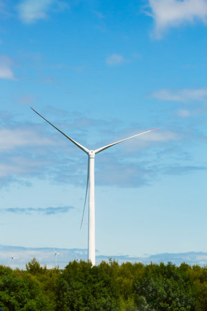Windmill farm for electric power production in the mountains of Croatia, in a beautiful bright day