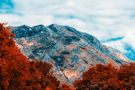 Mountain autumn landscape. Golden autumn in the mountains of Albania, Montenegro, Albania, Bosnia, Dinaric Alps Balkan Peninsula. Can be used for postcards, banners, posters, posters, flyers, cards.の写真素材