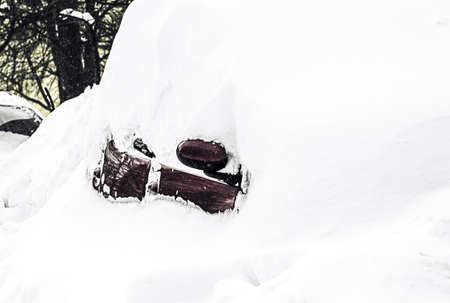 Car after Snow Storm Blizzard, Snow-covered car during a winter blizzard,の写真素材