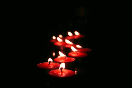 Candles in the dark. Memorial, hope, memorial symbolの写真素材