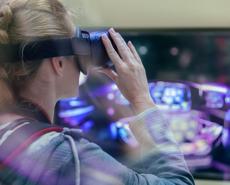 Young Cocausian Woman using Virtual Reality headset