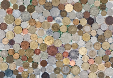 The background of the different coins and notesの写真素材