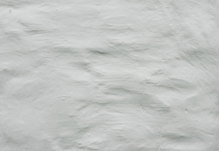 Old white wall stucco texture の写真素材