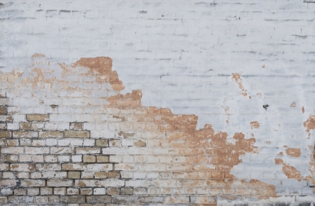 Background of vintage brick wall with  stucco textureの写真素材