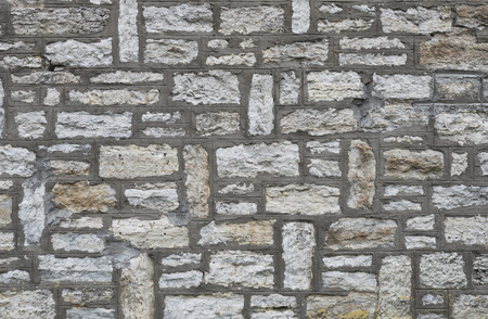 Background of limestone wall texture close upの写真素材