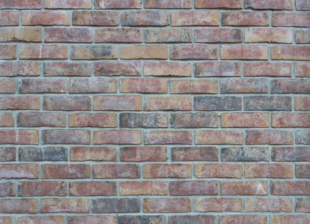 Background of old vintage brick wall textureの写真素材