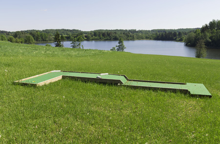 Small golf course built for children in a recreational spaceの写真素材