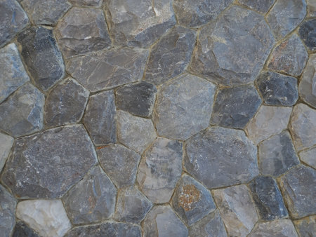 Background of stone wall texture, closeup, for design.の写真素材
