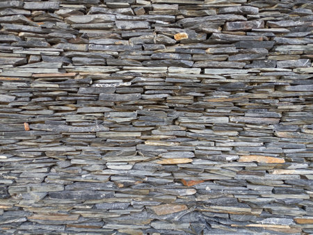 Background of stone wall texture for design with copy space for text or image.の写真素材