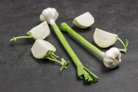 Head of garlic clove. Natural farm food. Products for immunity. Black background. Top viewの写真素材