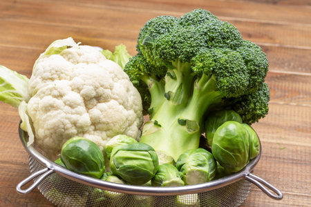 Clipboard with blank sheet and pen. Multicolored vegetables on table. Gray background. Flat lay. Copy spaceの写真素材