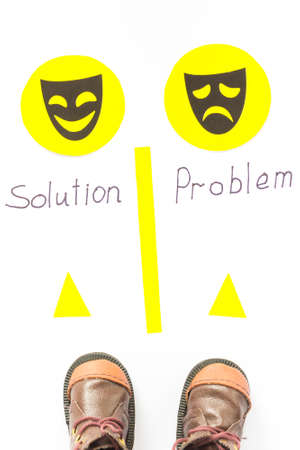 Mask - a smile, sadness Mask. brown shoes. yellow line. white backgroundの写真素材