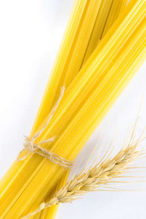 long noodles. Spikelet wheat on a white backgroundの写真素材