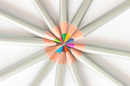 Colored pencils lined in a circle. white backgroundの写真素材