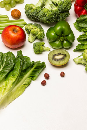 Set of vegetables, fruits and lettuce leaves on a white background. flat lay. copyspace.の写真素材